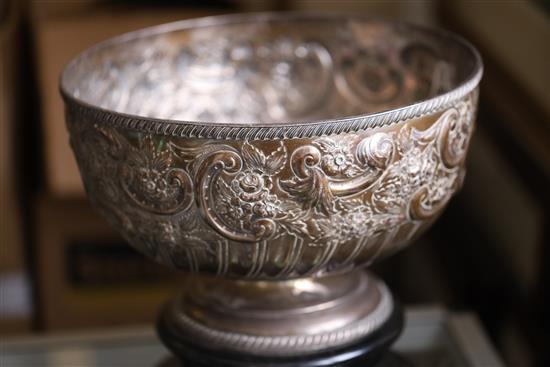 A late Victorian repousse silver presentation pedestal punch bowl, by William Hutton & Sons, 48.5 oz.